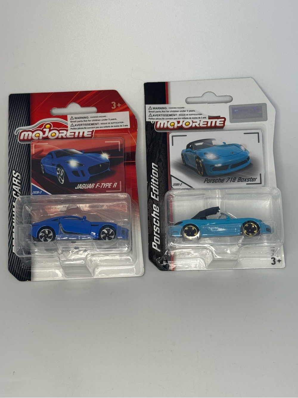 2 Majorette Jaguar (1:59) and Porsche 718 (1:58) New in Pkg with Cards